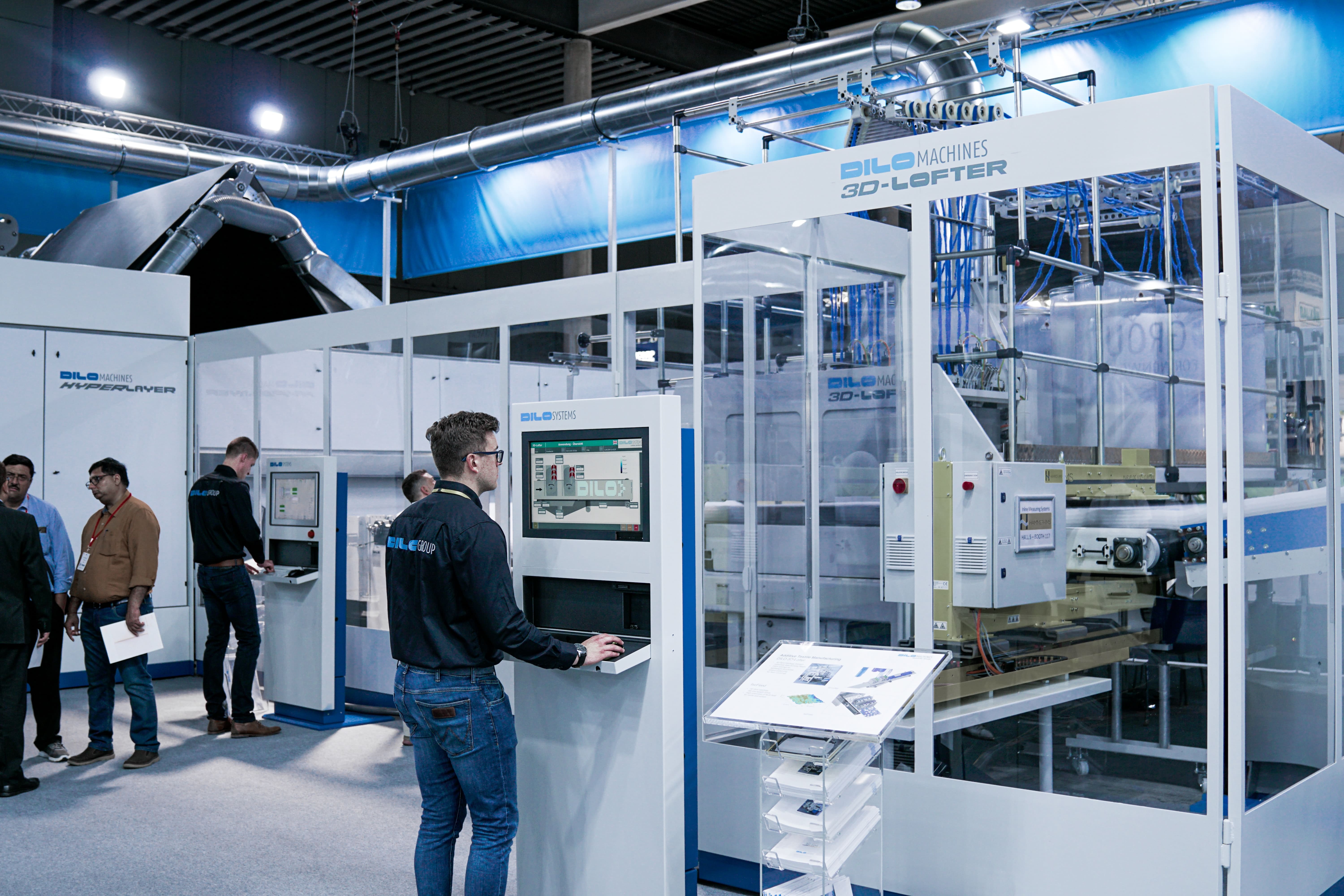 worker at an automated assembly terminal