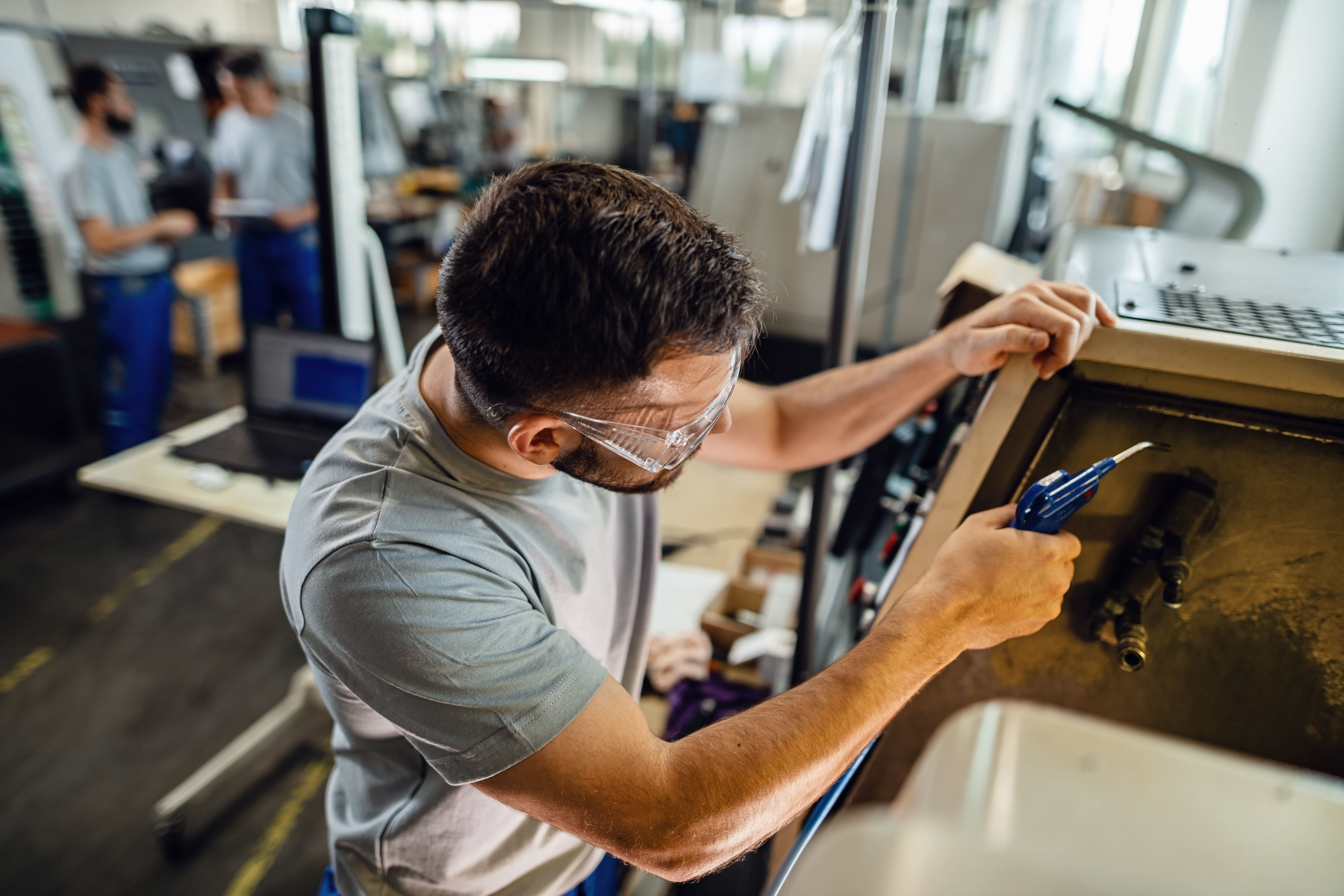 worker at work in personal protective equipment