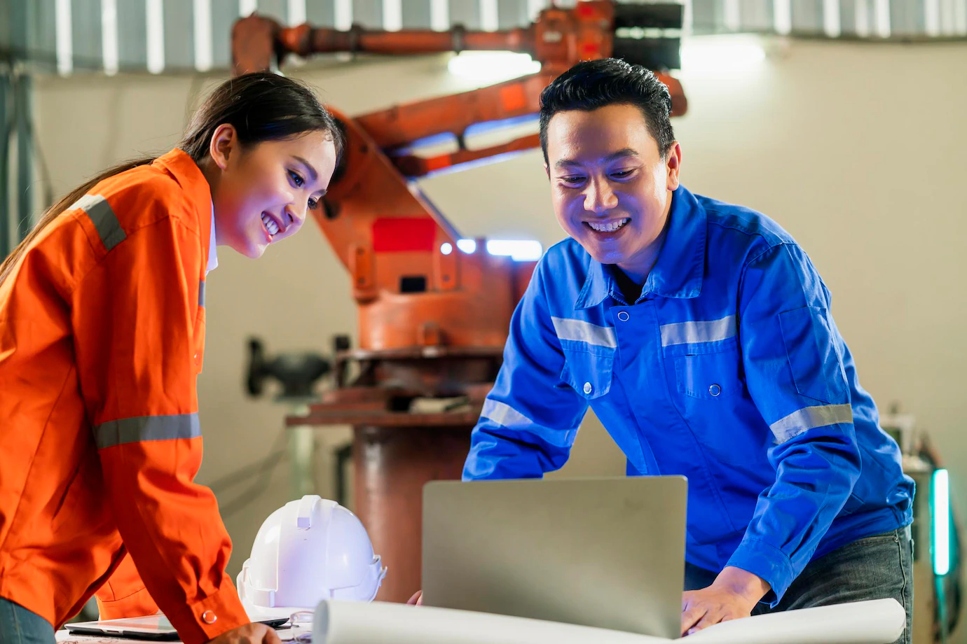 workers at laptop